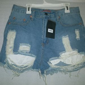 New distress ripped denim short's